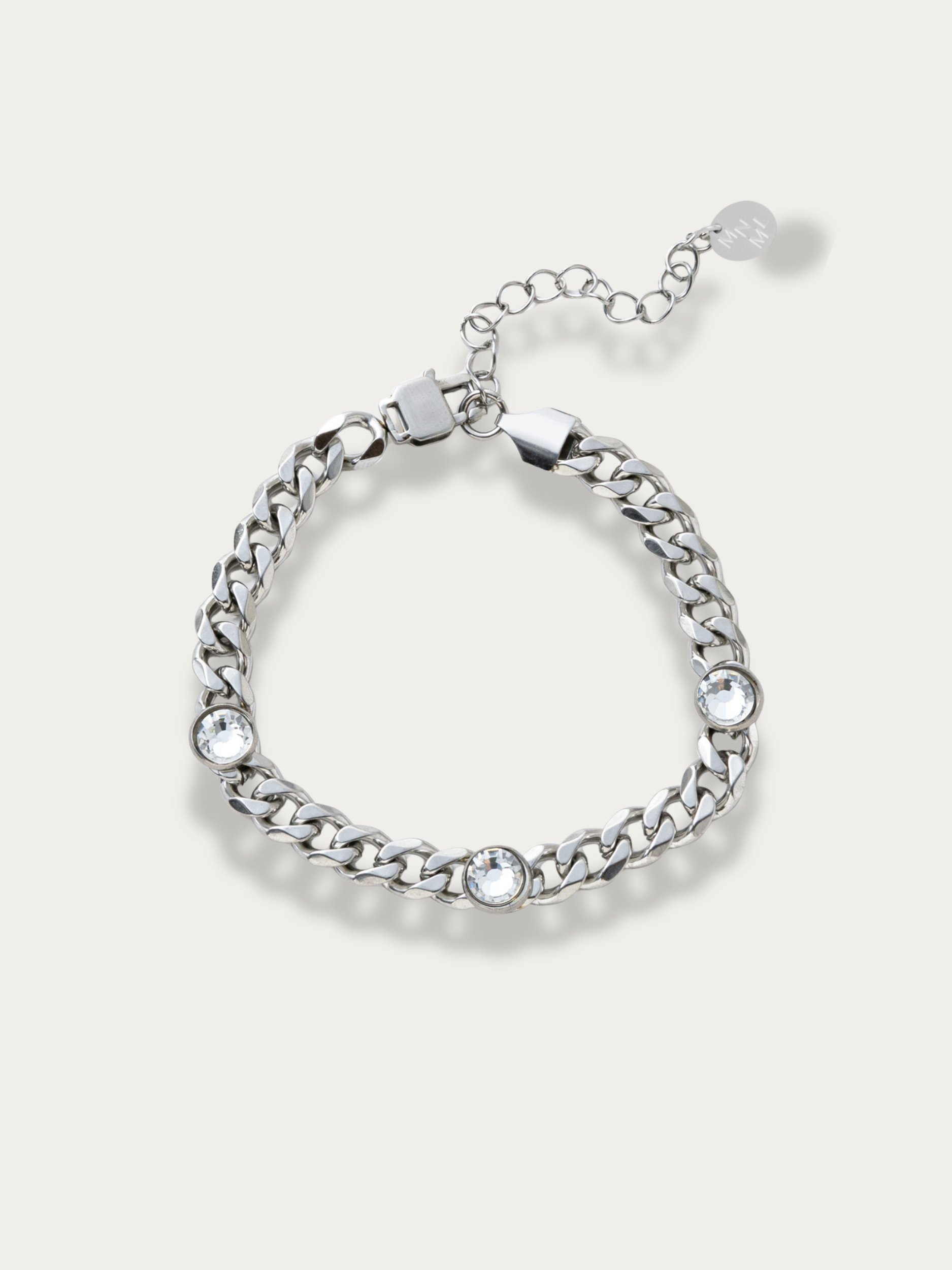 Delphine Bold CZ Curb Chain Bracelet silver tone stainless steel with three bezel-set CZ stones, product flatlay