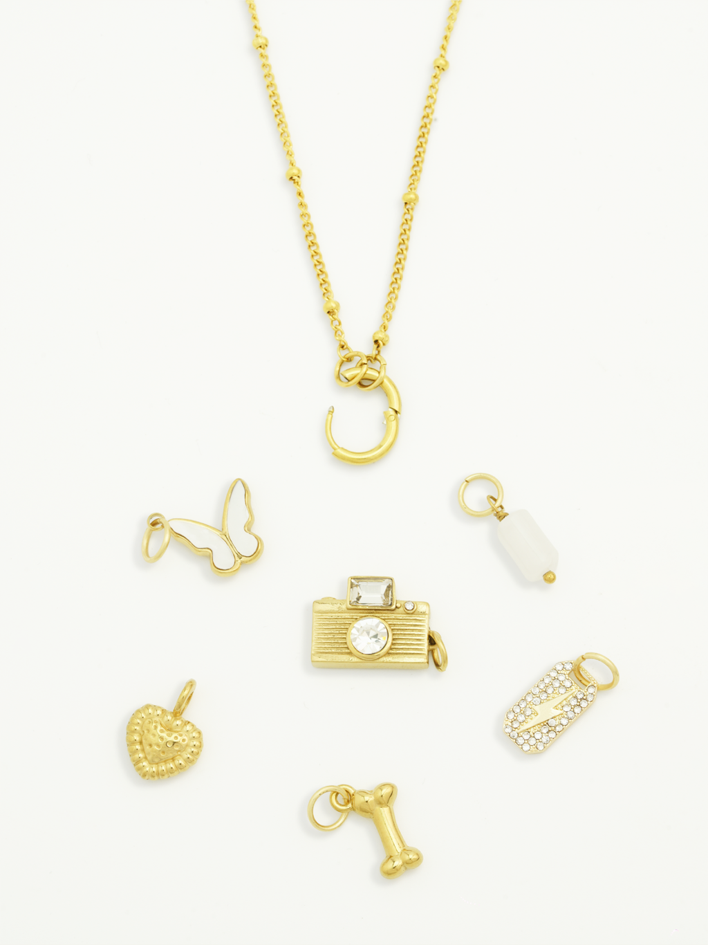 Minimalist bone charm 18K gold plated