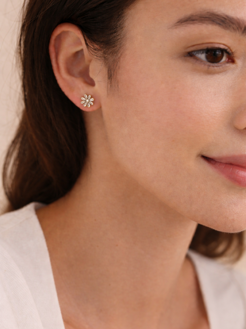 Model wearing Elia Daisy Stud Earrings on ear