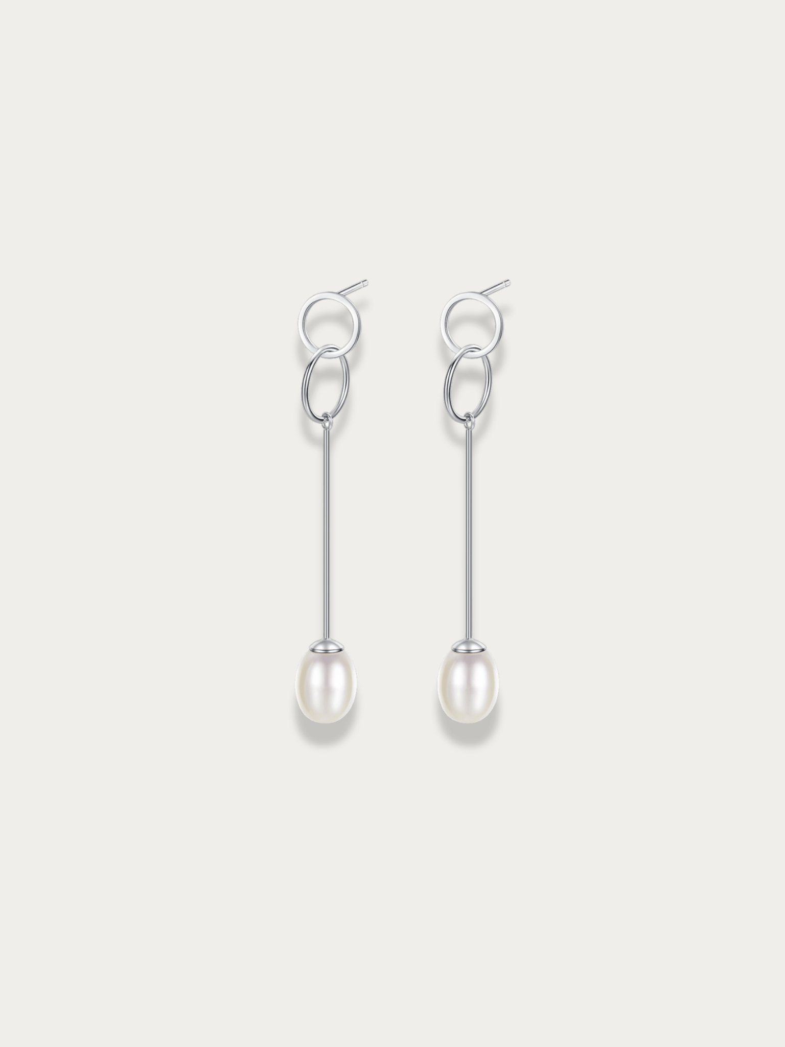 Elodie Freshwater Pearl Drop Earrings in white pearl, 925 sterling silver product flatlay