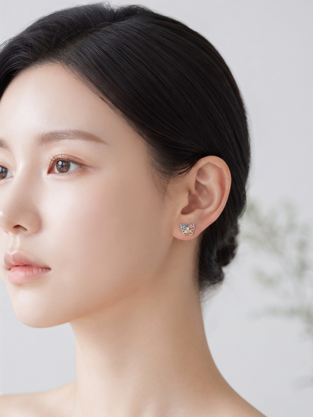 Model wearing EMERSON Butterfly Diamond Ear Stud