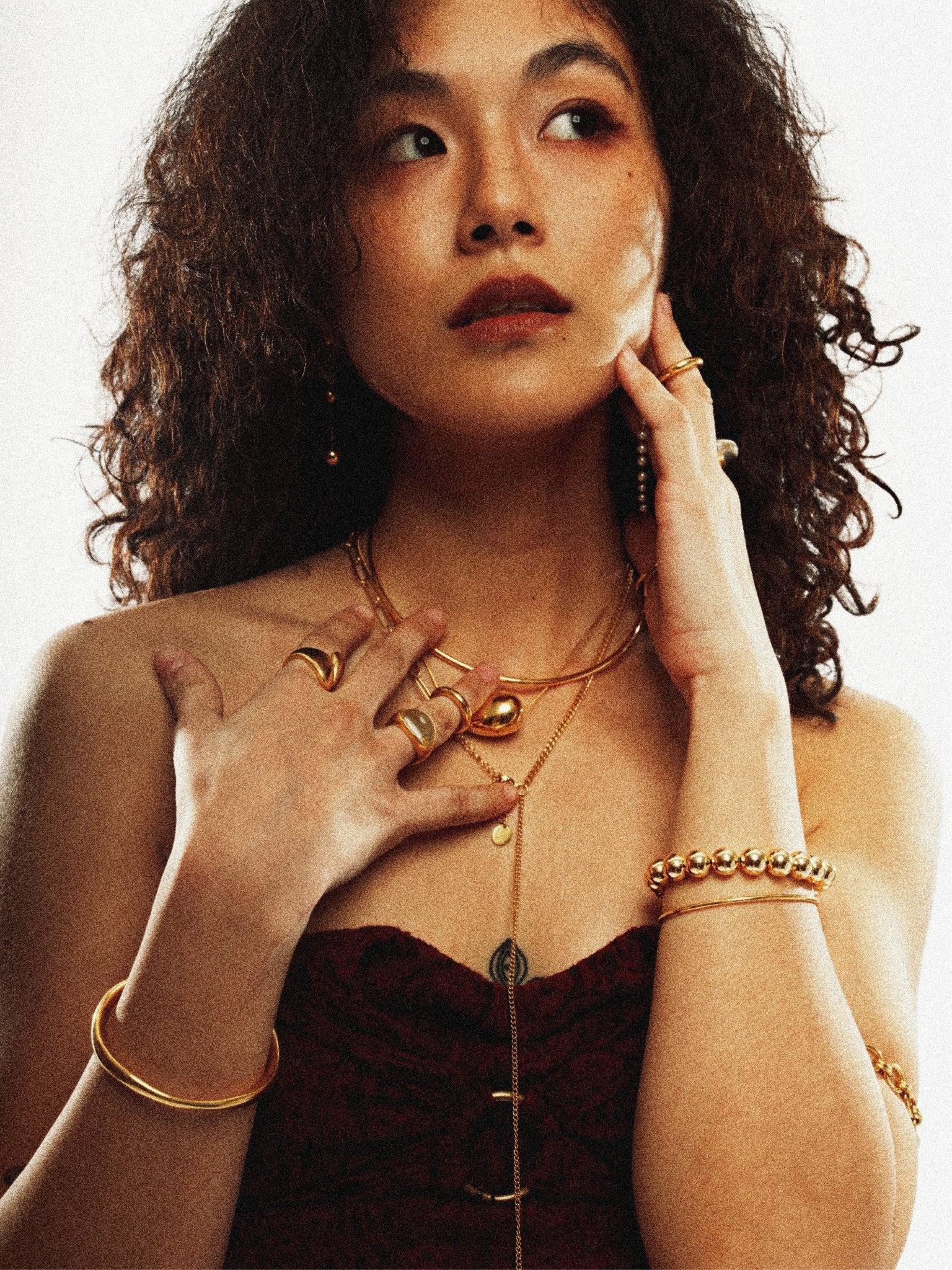 Enso Orbital Bangle gold tone worn on wrist, minimalist open cuff bangle Malaysia lifestyle