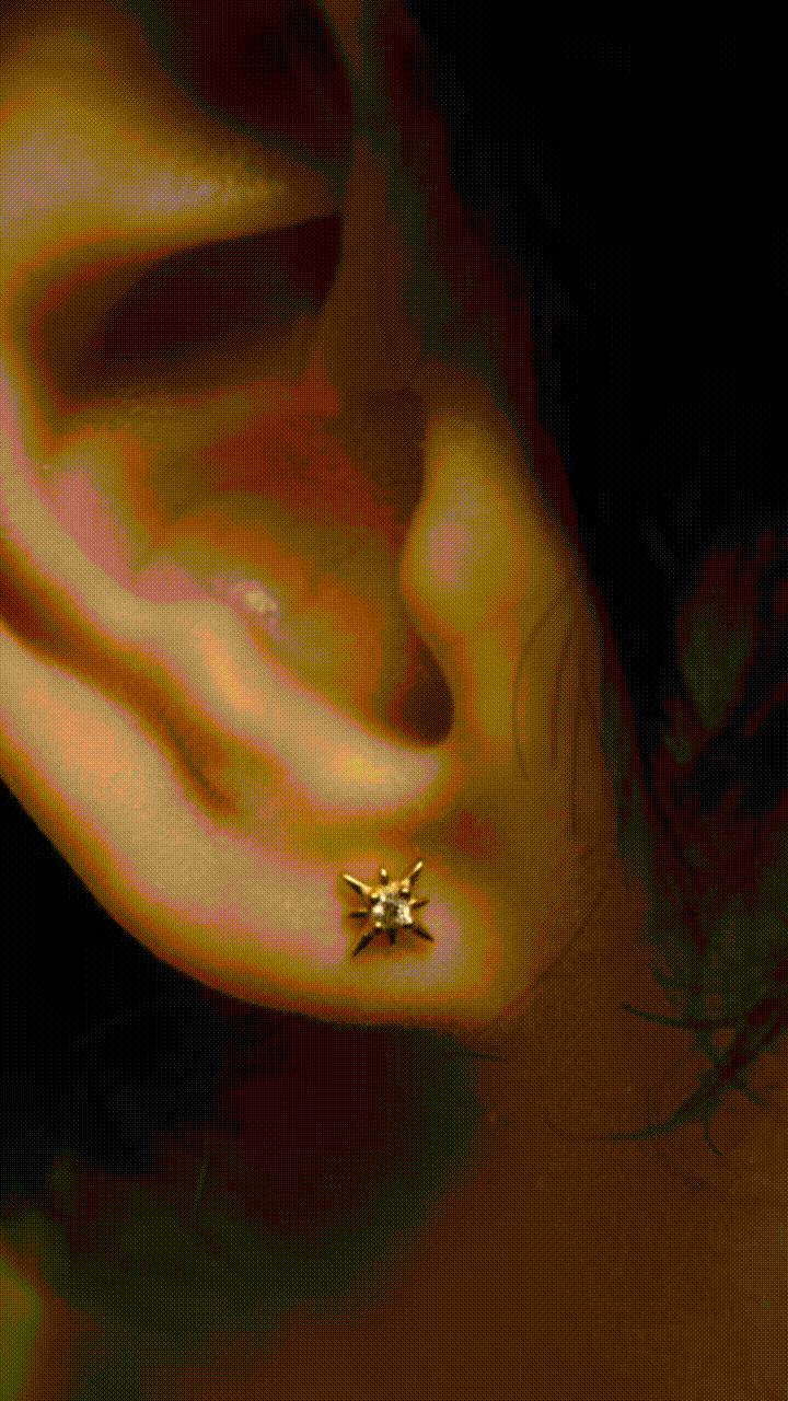 Close-up of FELIX Starlight star stud earring