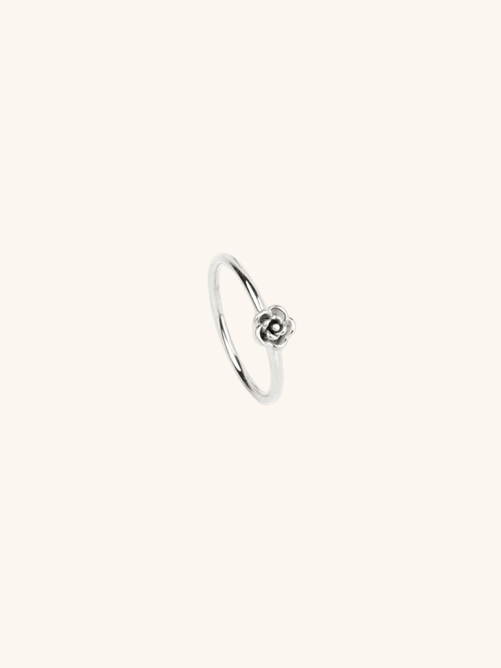 Flower Petals Ring silver tone stainless steel, sculpted 3D rose motif on slim band, product flatlay