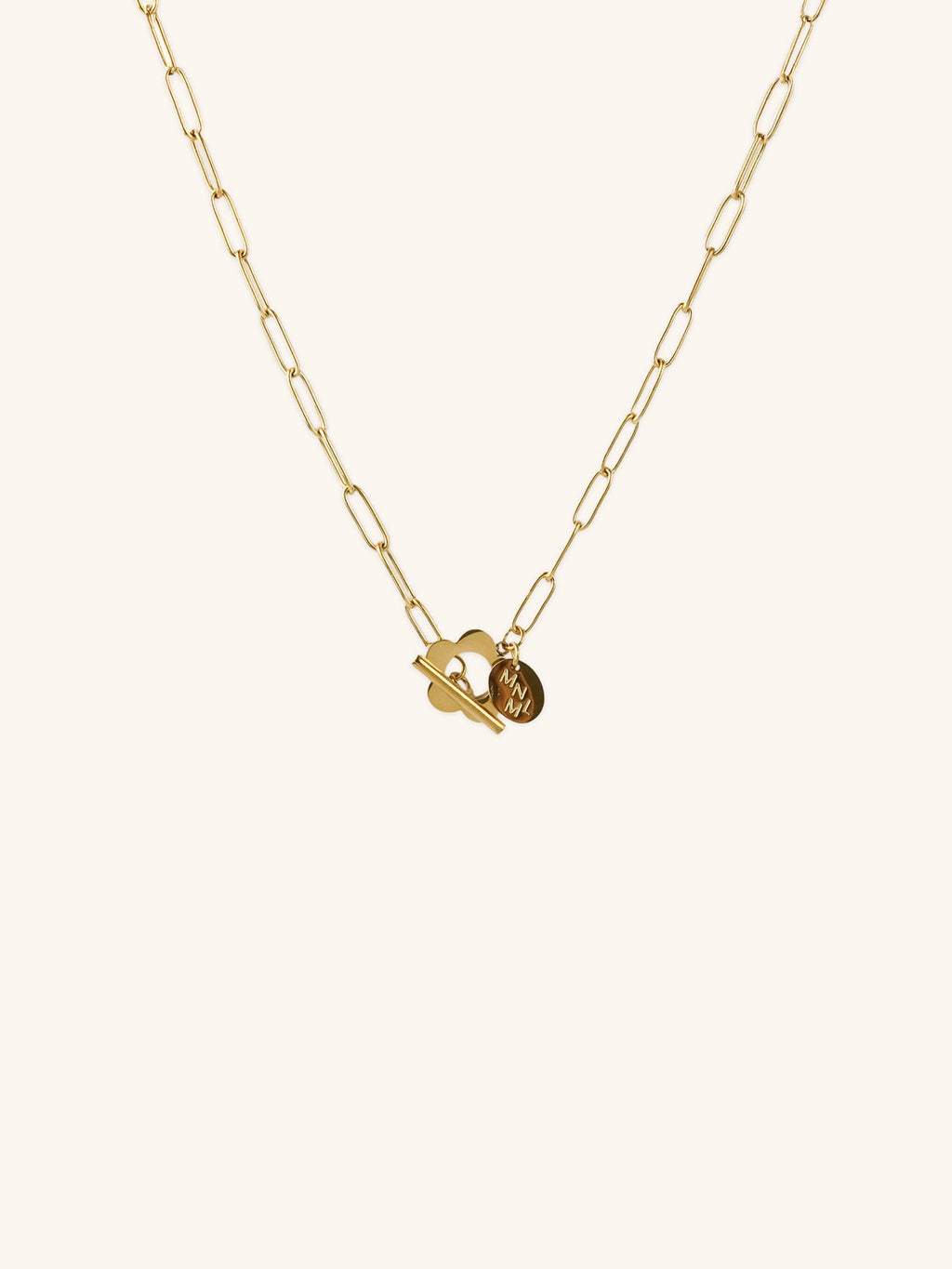 Flower Toggle Necklace gold tone stainless steel, bold paperclip chain with front toggle clasp and flower charm, product flatlay