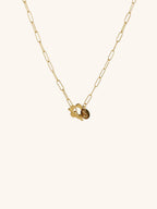 Flower Toggle Necklace gold tone stainless steel, bold paperclip chain with front toggle clasp and flower charm, product flatlay