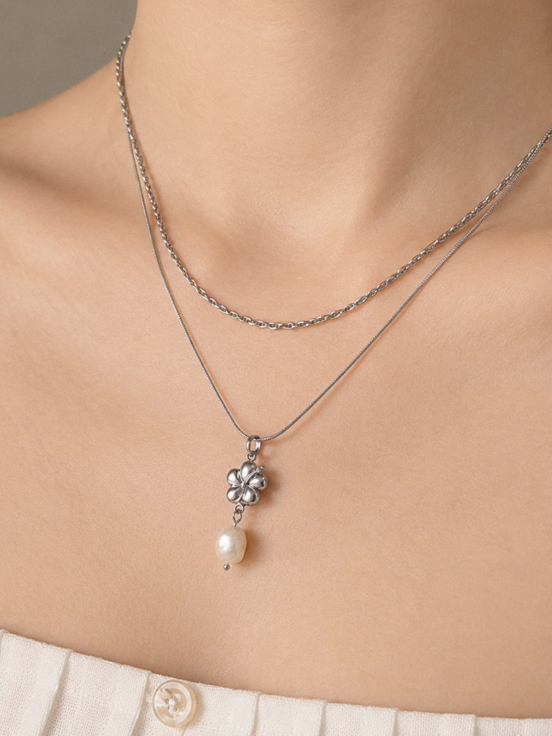Freshwater Pearl Hibiscus Layered Necklace worn on neckline