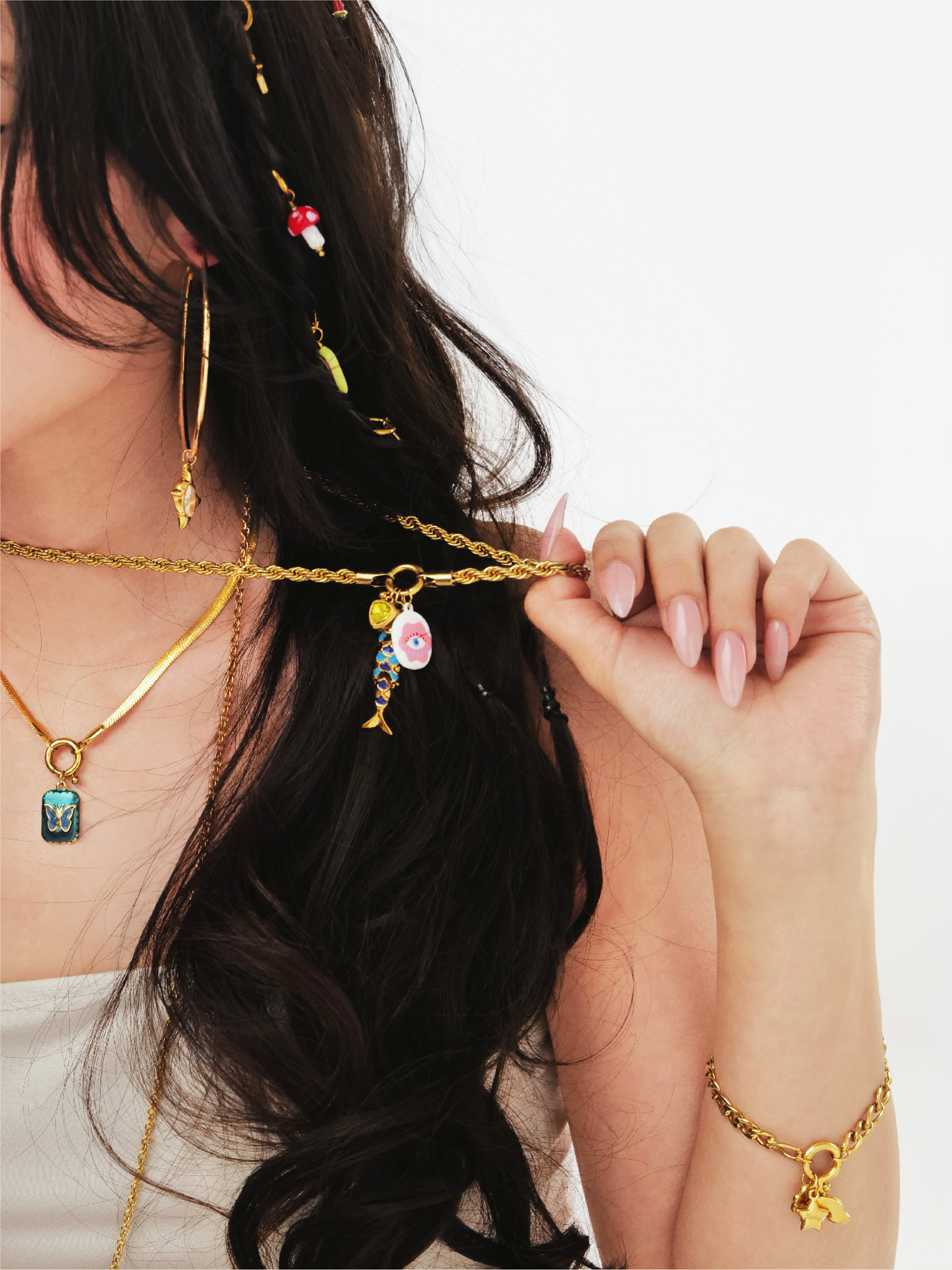 Gold inverted triangle charm layered styling