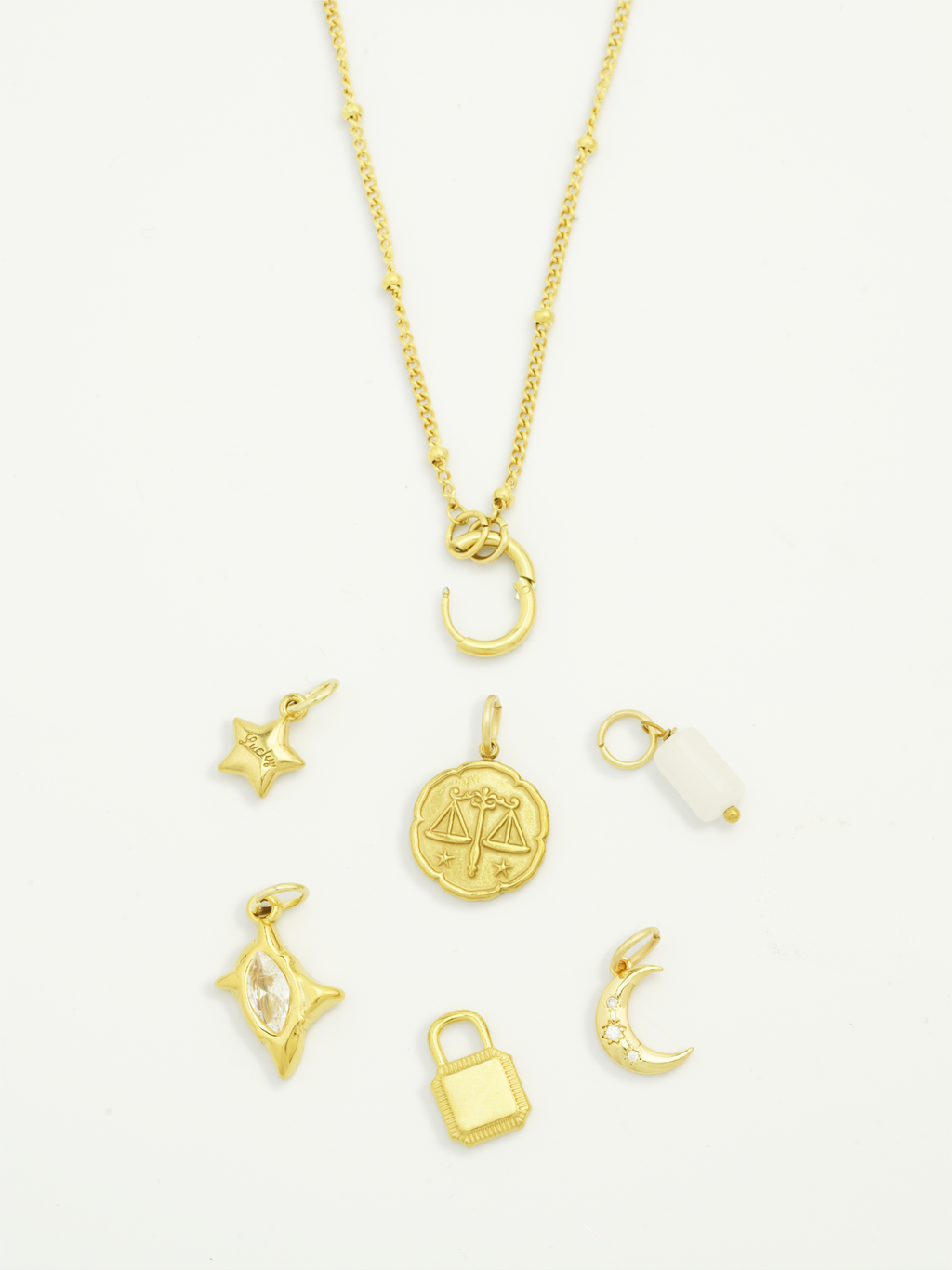 Gold starburst charm with zircon stone DIY jewellery