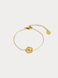 Golden Clover Bracelet in 18K gold-plated titanium with clover pendant, studio hero shot