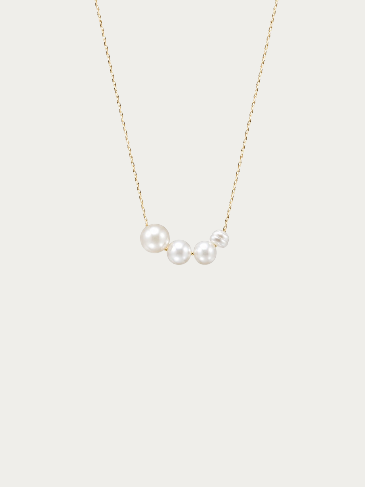 Harmony Pearl Gradient Necklace with five graduated freshwater pearls in gold colour