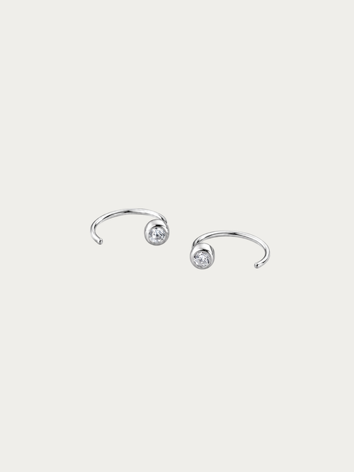 Haze Everyday Huggie pair in 925 sterling silver with bezel-set cubic zirconia, studio hero shot