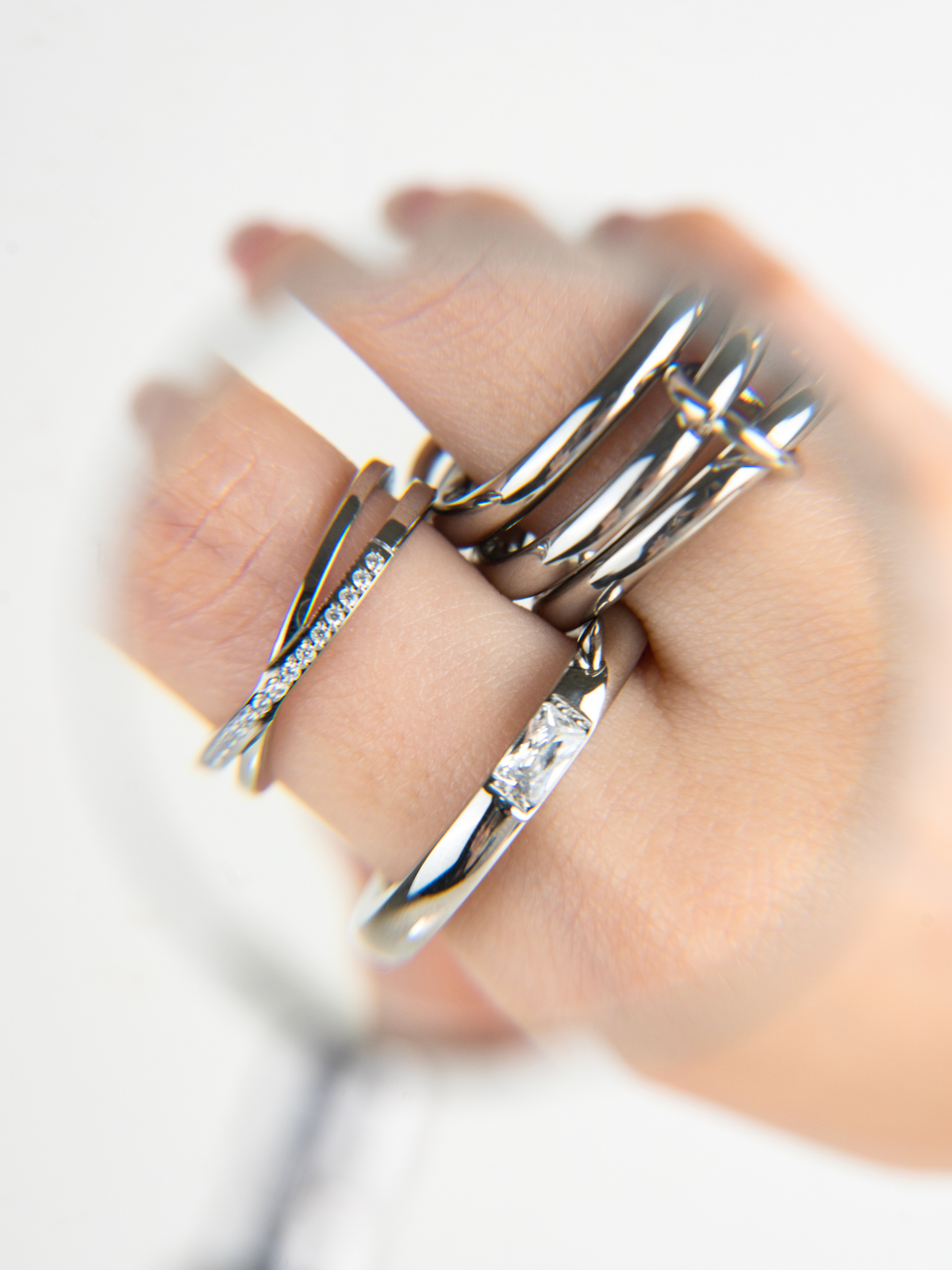 Close-up of rectangular-cut gemstone on Horizon Dome Ring