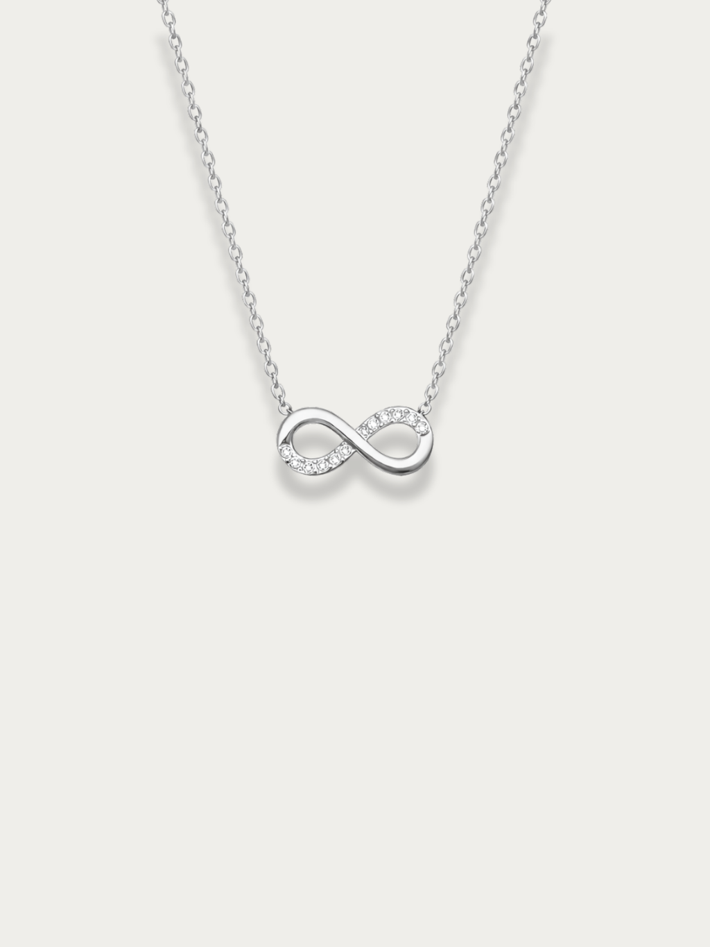 infinity pendant necklace with cz detail close up