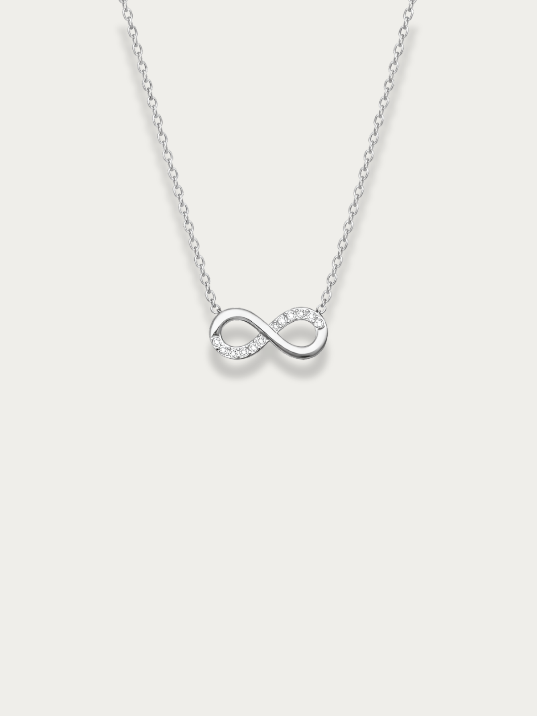 infinity pendant necklace with cz detail close up