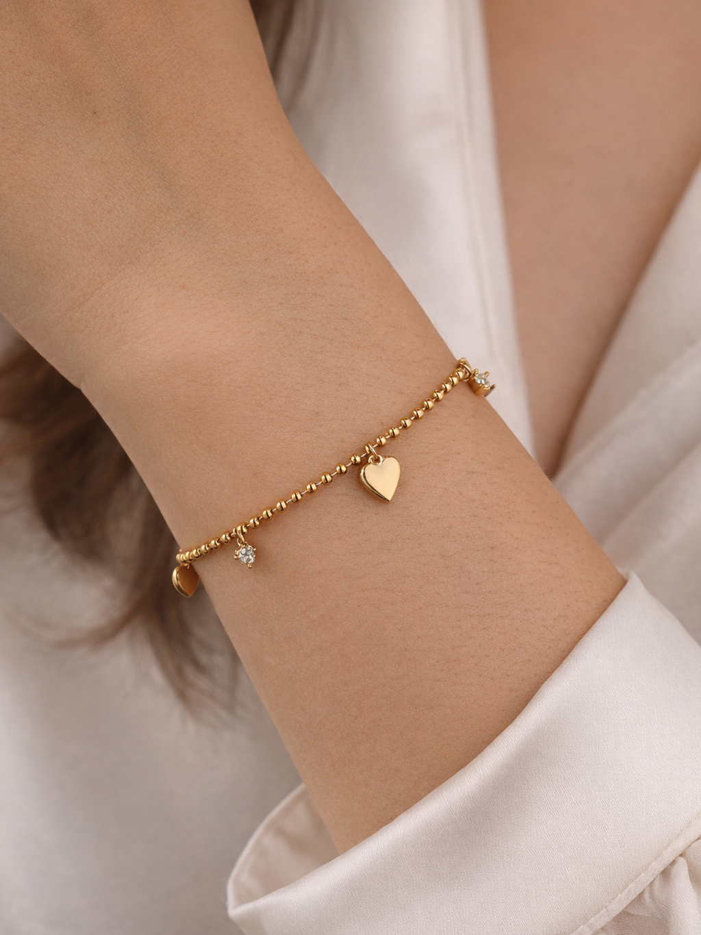 Jaye Heart Charm Bracelet gold tone worn on wrist, minimalist heart charm bracelet Malaysia lifestyle