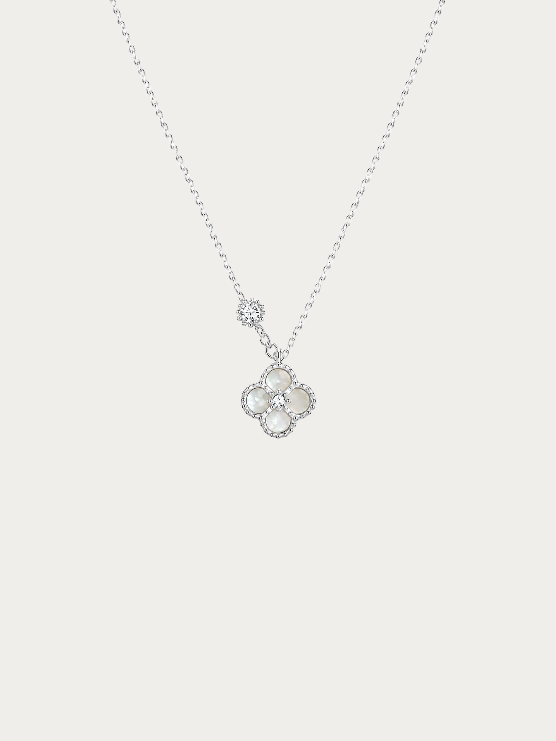 Jolie Clover Necklace in white Mother of Pearl with cubic zirconia accent
