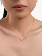 Jupiter Cascading Spark Necklace in silver colour worn on neckline