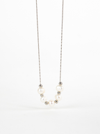 Close-up of naturally irregular freshwater pearls on Kindred Necklace