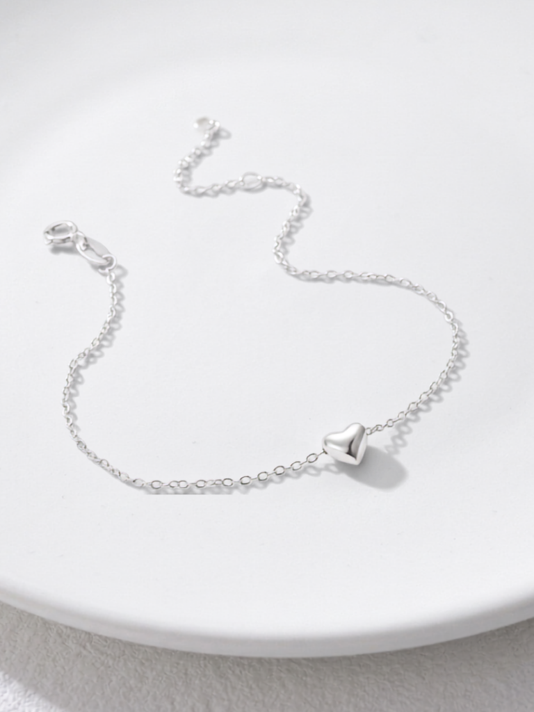 Close-up of 925 sterling silver LL'AMOUR bracelet