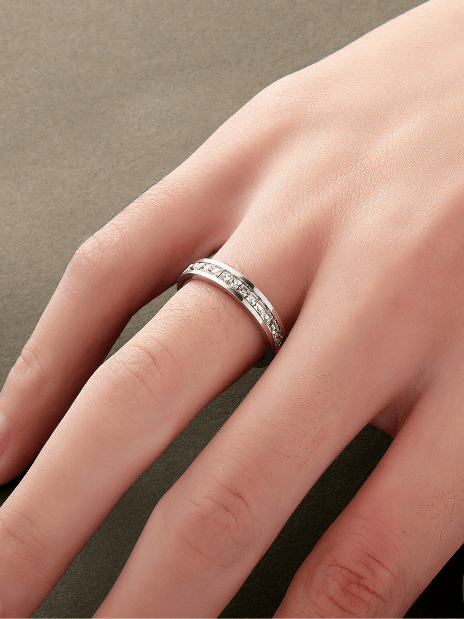 minimalist titanium ring worn on hand