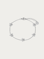 Lilabelle Blossom Spark Bracelet with five floral motifs in silver