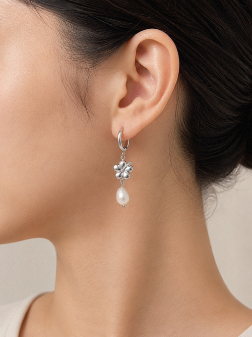 Freshwater Pearl Hibiscus Hoop Earrings worn on model's ear