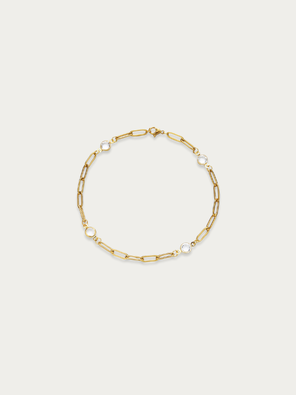 Lina Crystal Link Bracelet gold tone stainless steel, paperclip chain with four crystal bezels, product flatlay