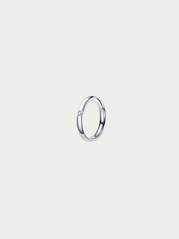 Linea Band Ring silver tone stainless steel, 3mm dome band with prong-set CZ stone, product flatlay