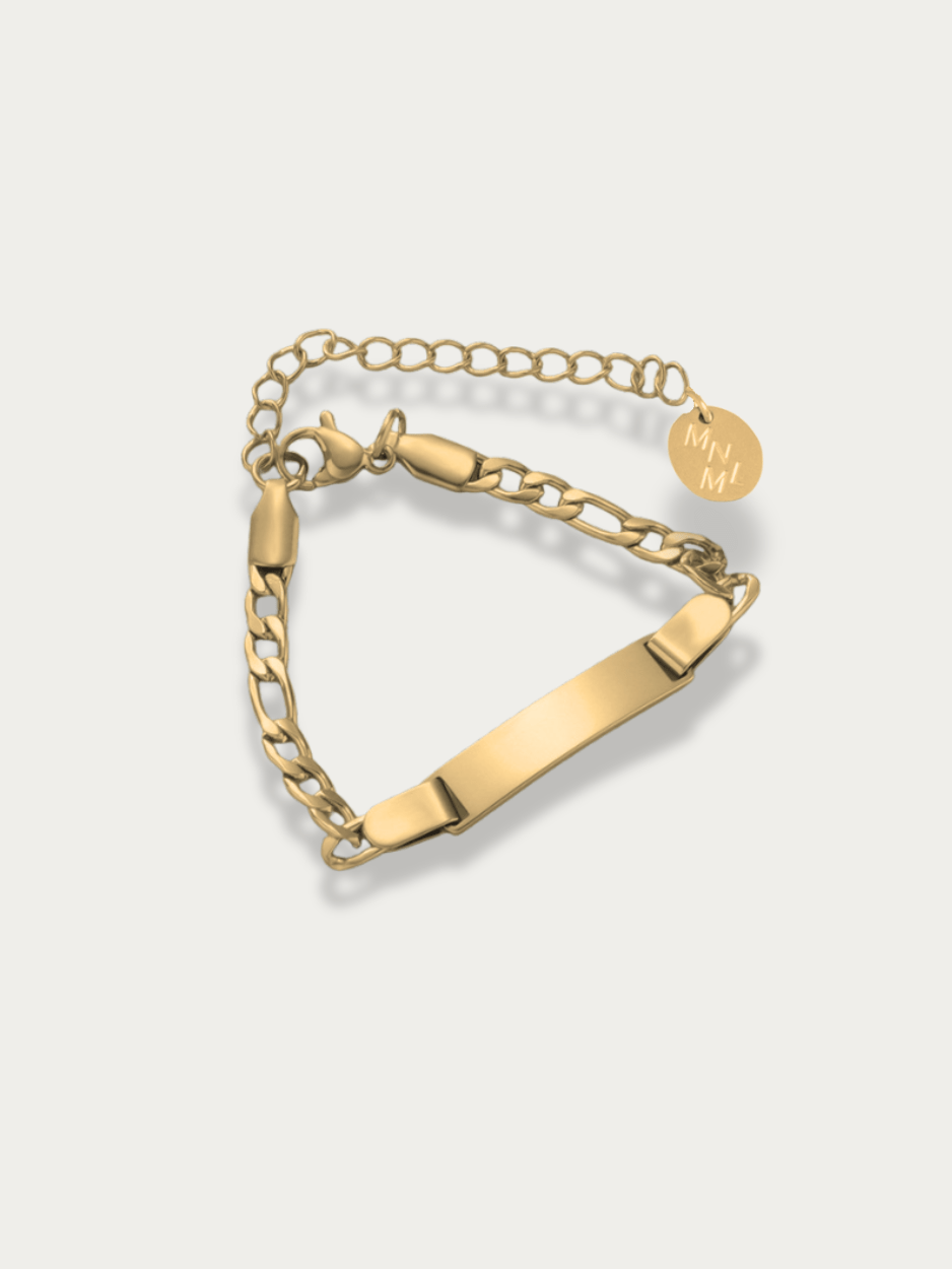 Lullaby Junior Figaro Engravable Bracelet gold tone titanium, ID plate with figaro chain, product flatlay