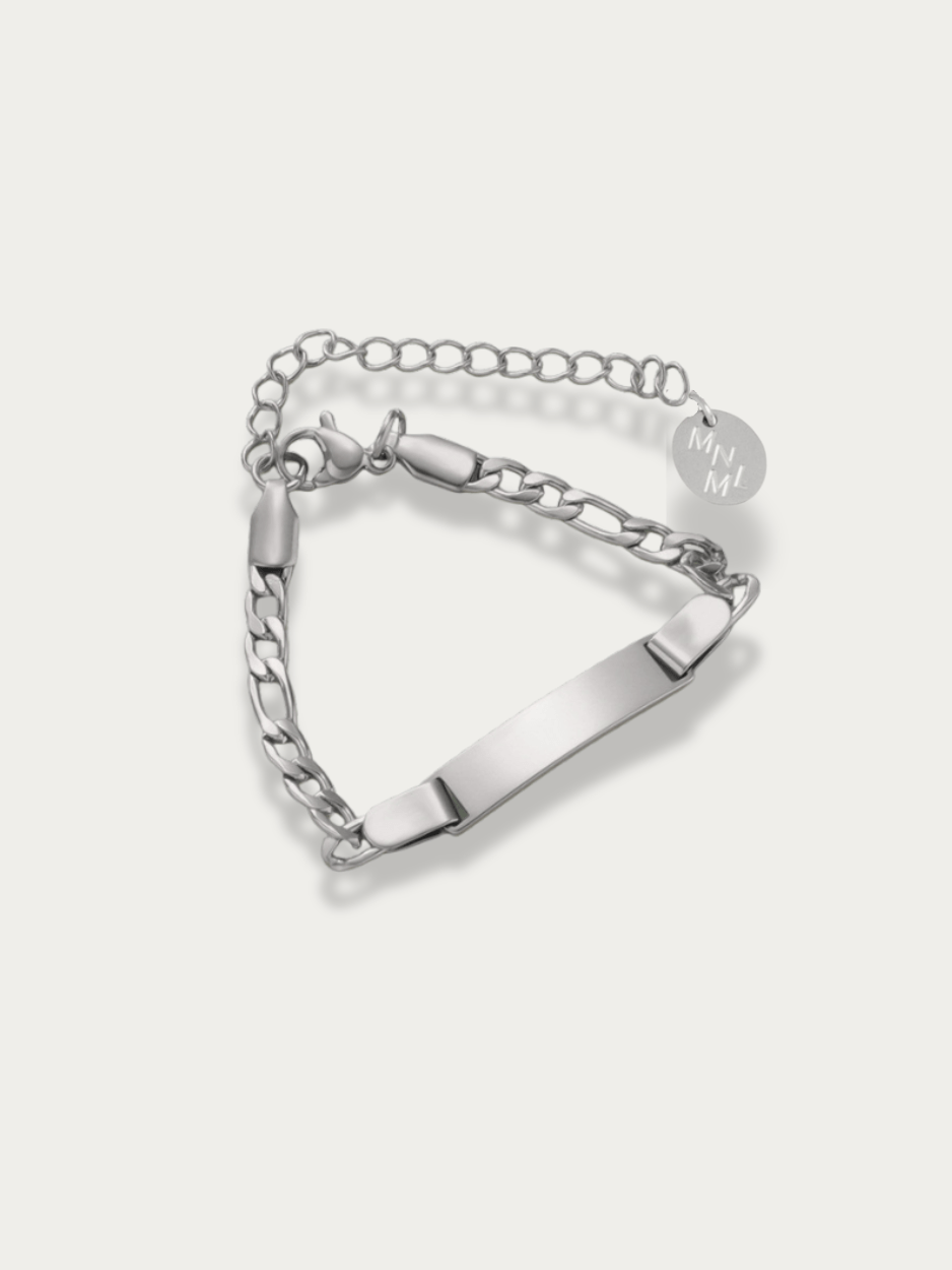 Lullaby Junior Figaro Engravable Bracelet silver tone titanium, ID plate with figaro chain, product flatlay