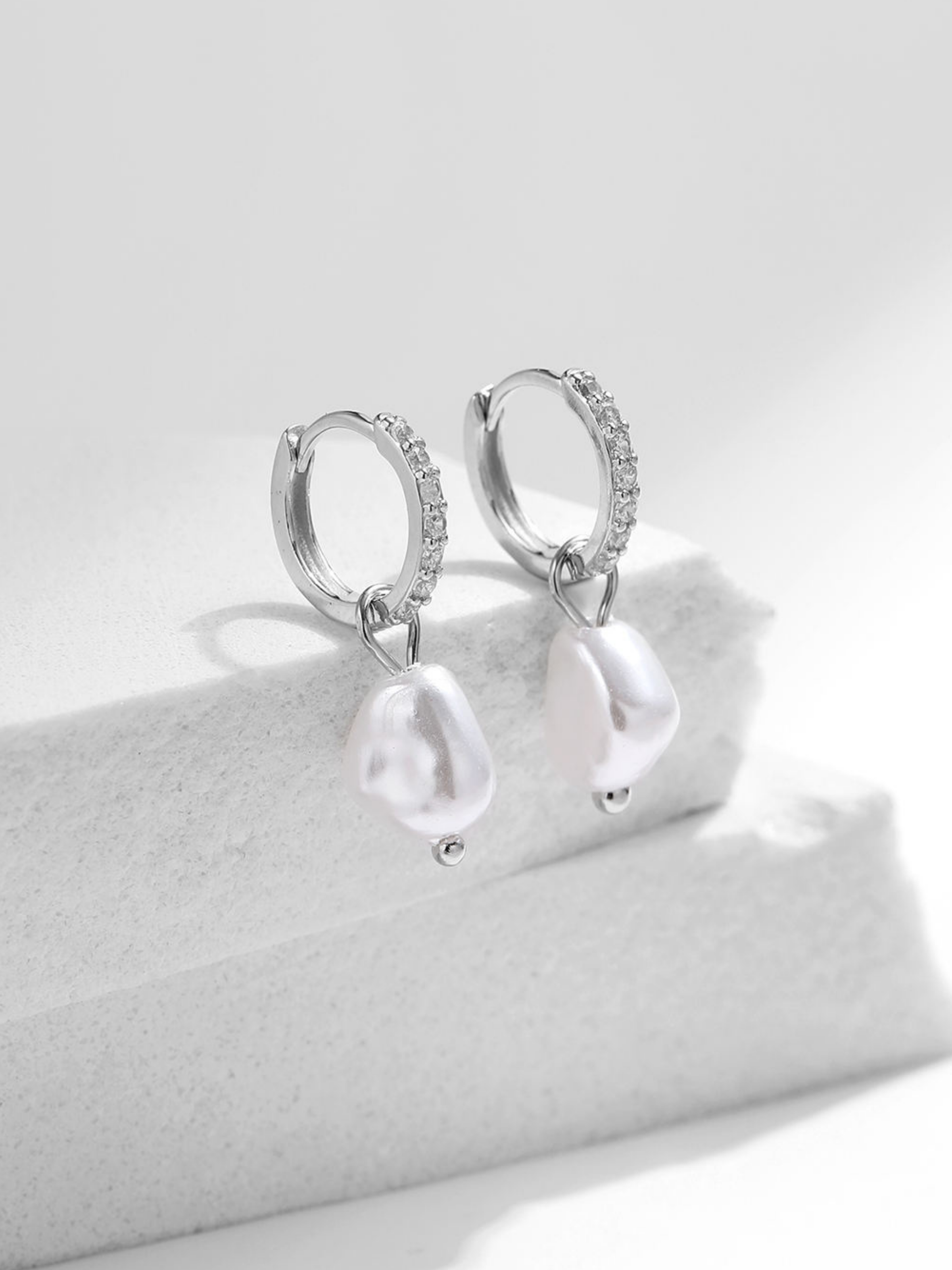 Close-up of LUMI Baroque Pearl Ear Hoop pearl detail