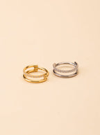 Lumi Diamonds Nose Ring gold and silver tone titanium, double-band pavé CZ nose ring, product flatlay