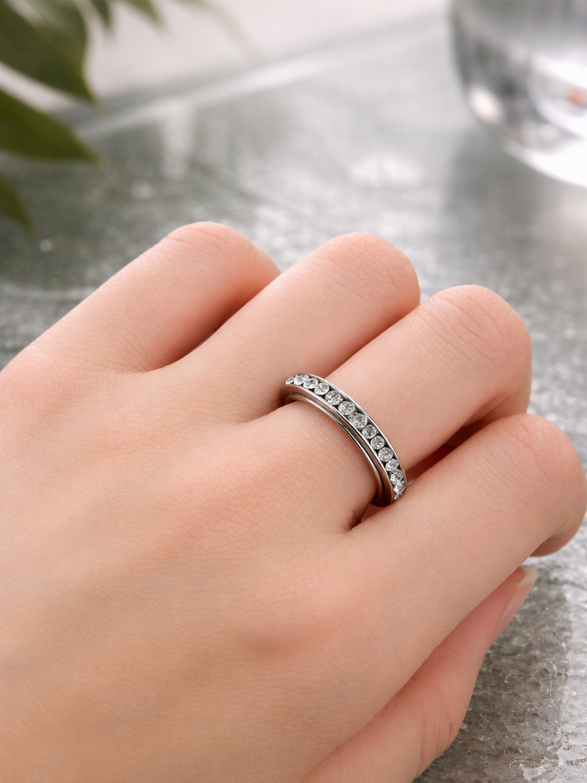 minimalist spinning ring worn on hand