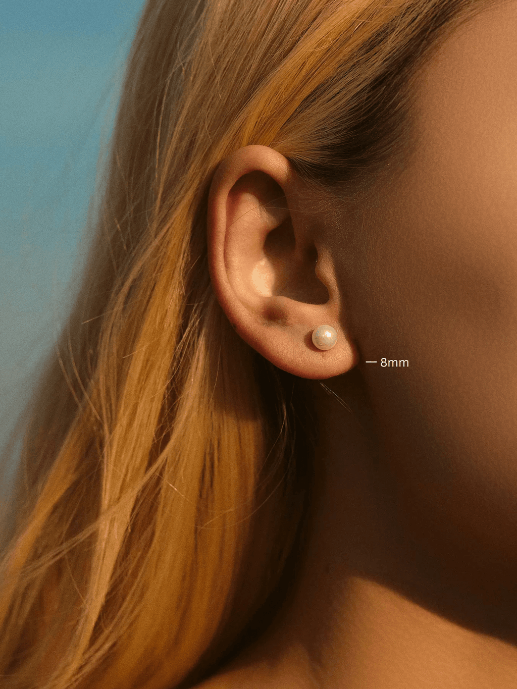 Meghan Pearl Stud Earrings 8mm worn on ear, classic pearl studs MNML Malaysia