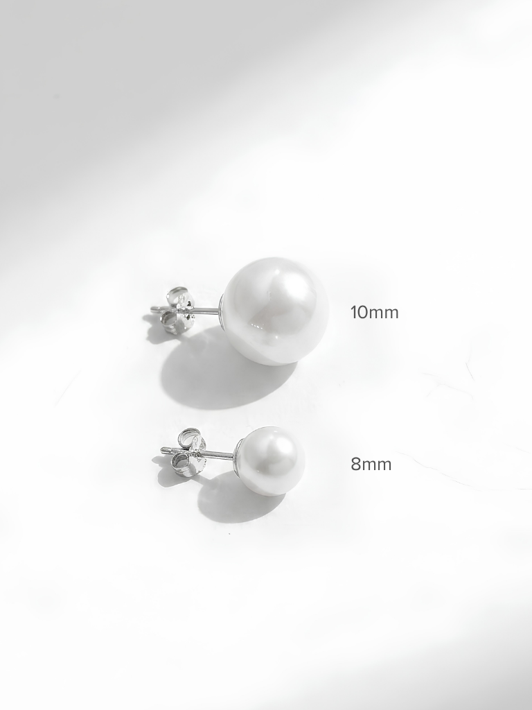 Model wearing MEGHAN Pearl Studs, 8mm and 10mm size comparison