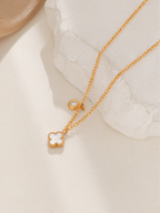mini clover pendant with pearlescent shell inlay titanium