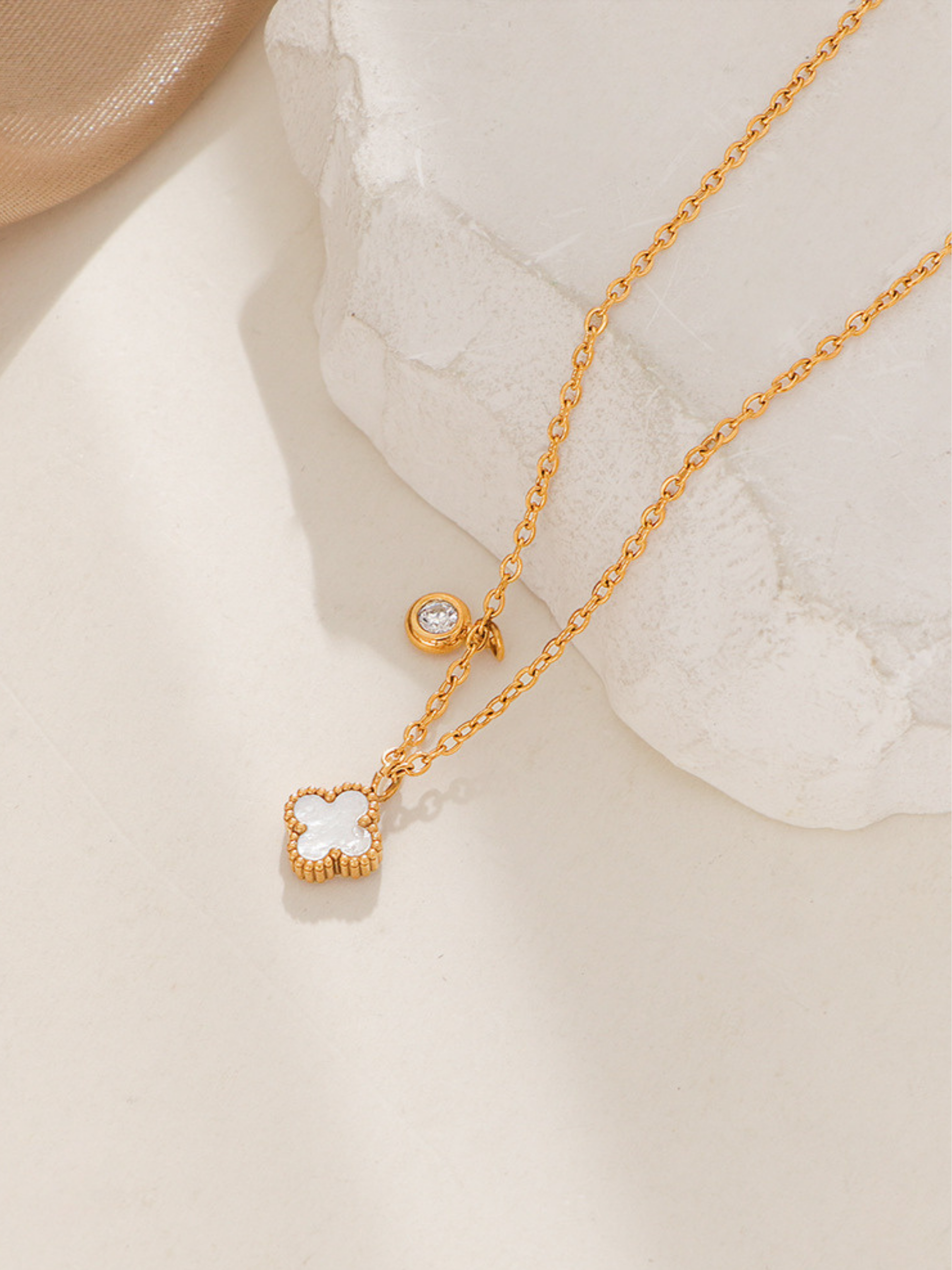 mini clover pendant with pearlescent shell inlay titanium