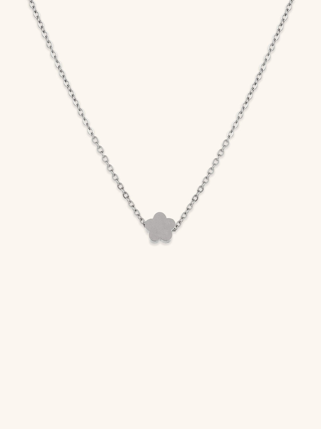 Mini Flower Engravable Necklace silver tone titanium, flat five-petal flower pendant on fine cable chain, product flatlay