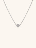 Mini Flower Engravable Necklace silver tone titanium, flat five-petal flower pendant on fine cable chain, product flatlay