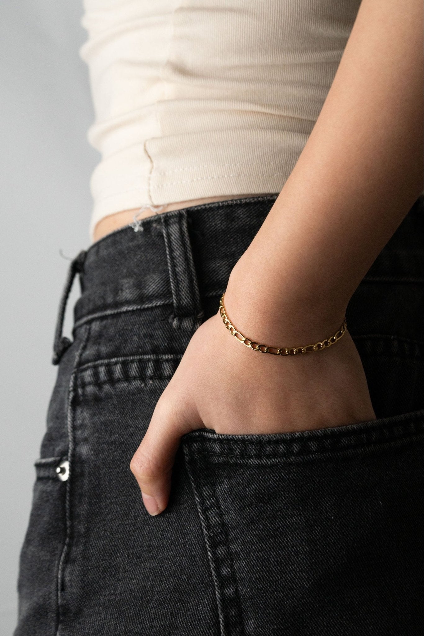 minimalist Figaro link bracelet gold finish