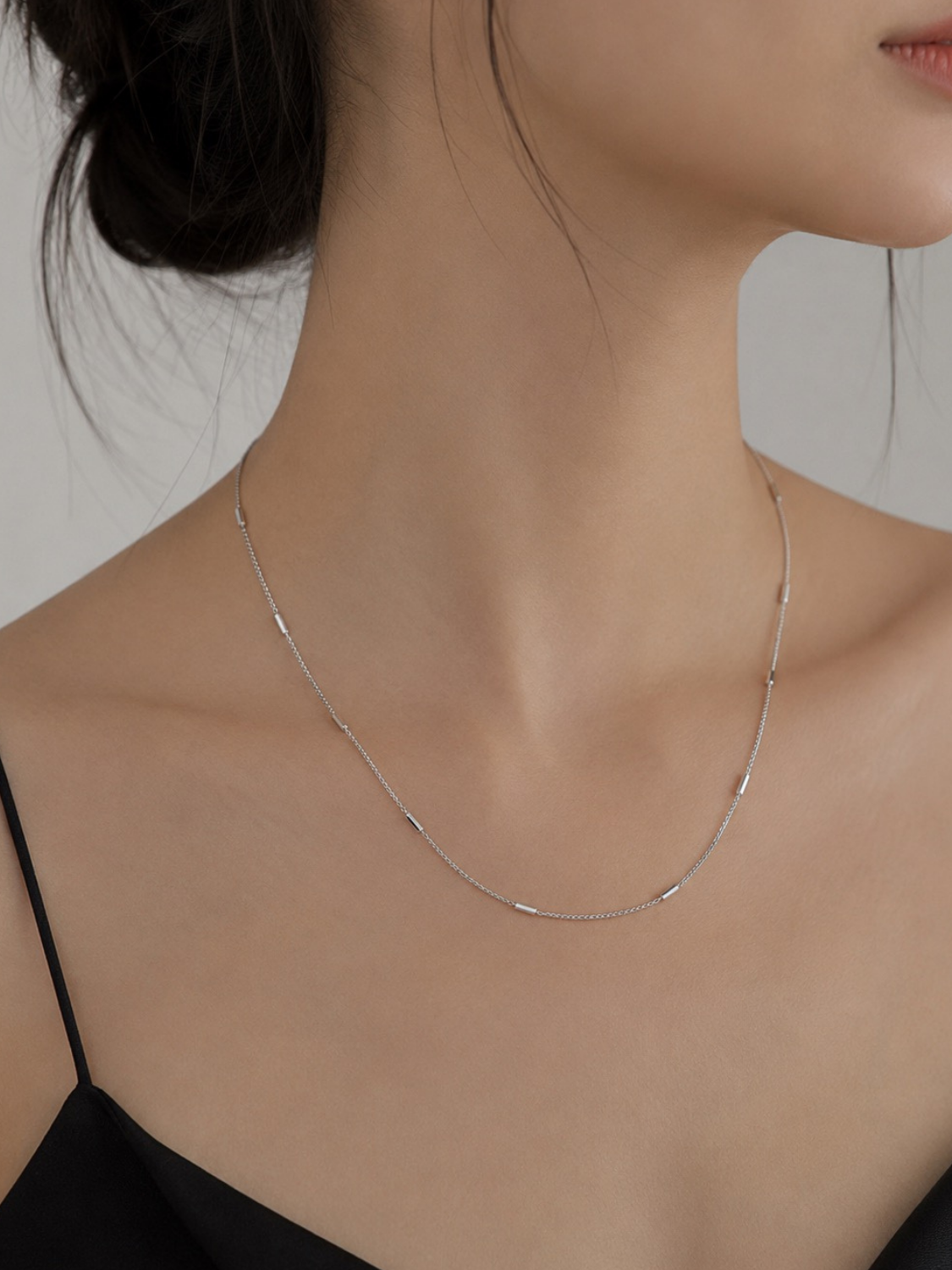 Close-up of tube link detailing on Minimalist Tube Link Necklace