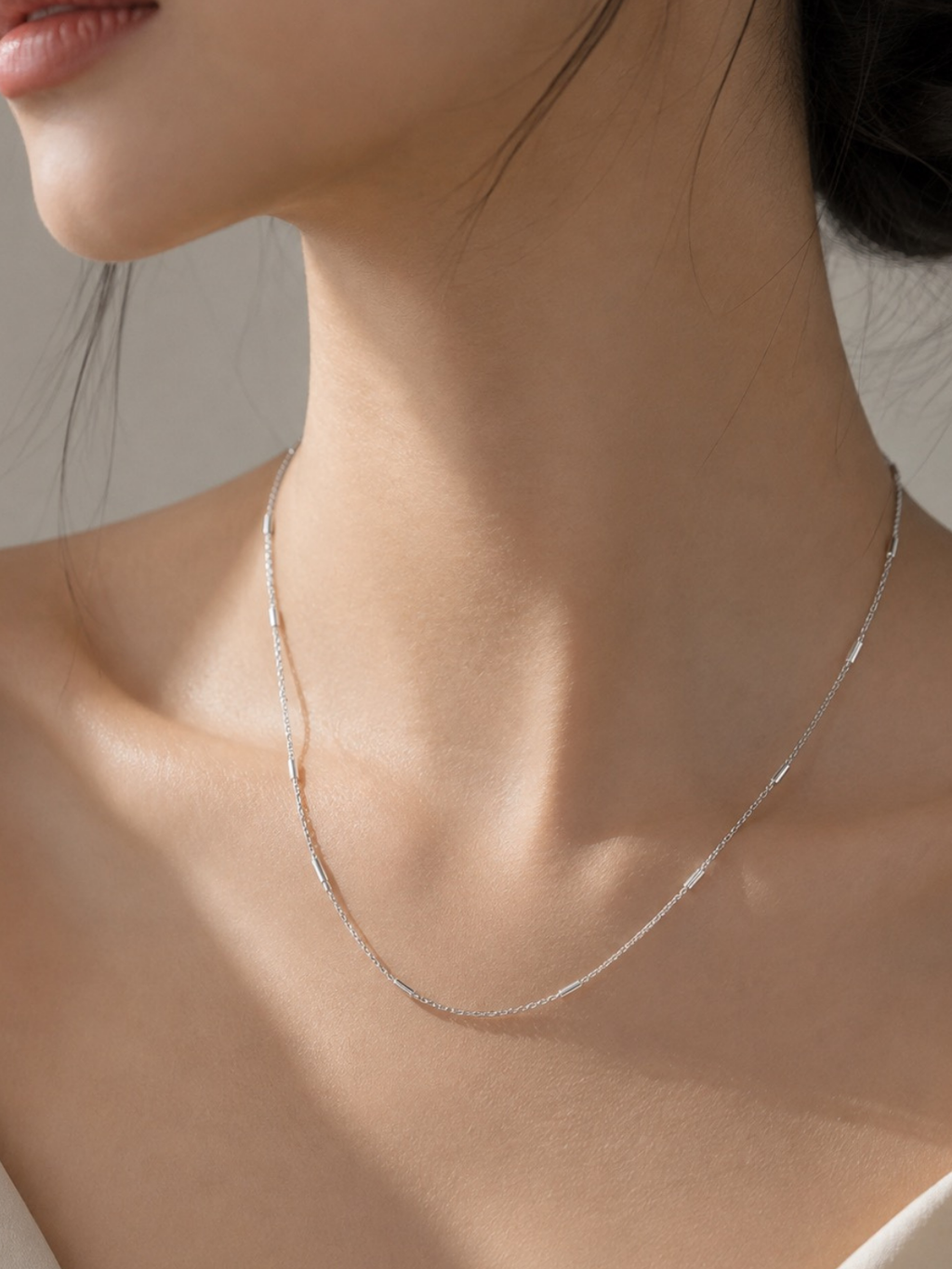 Minimalist Tube Link Necklace worn on neckline