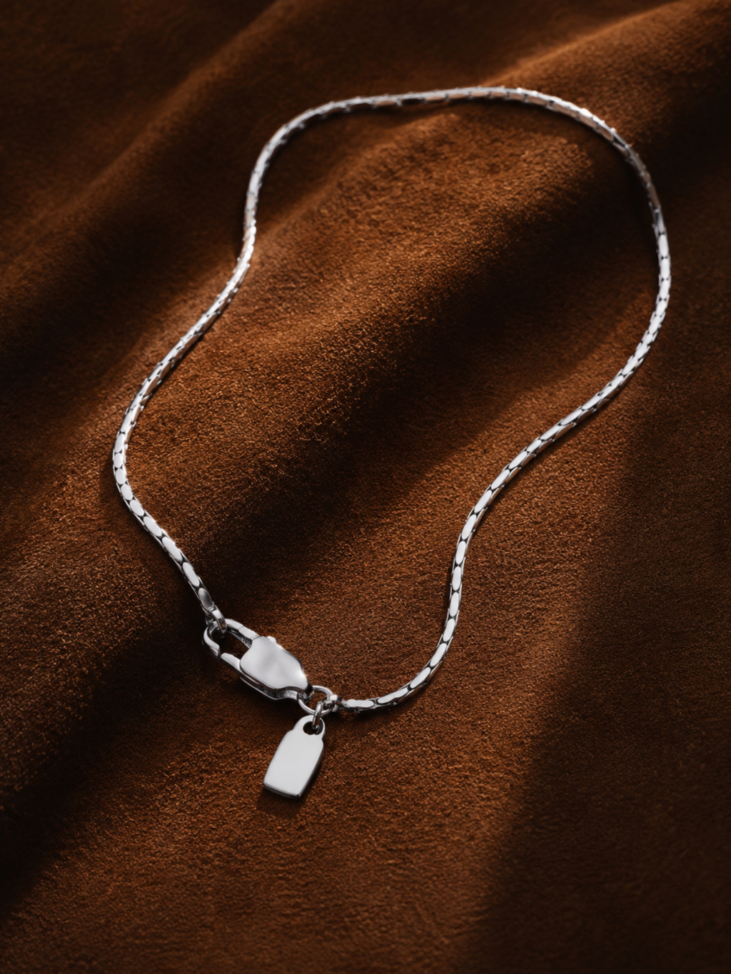 Minimalist Wheat Chain Bracelet flatlay in silver