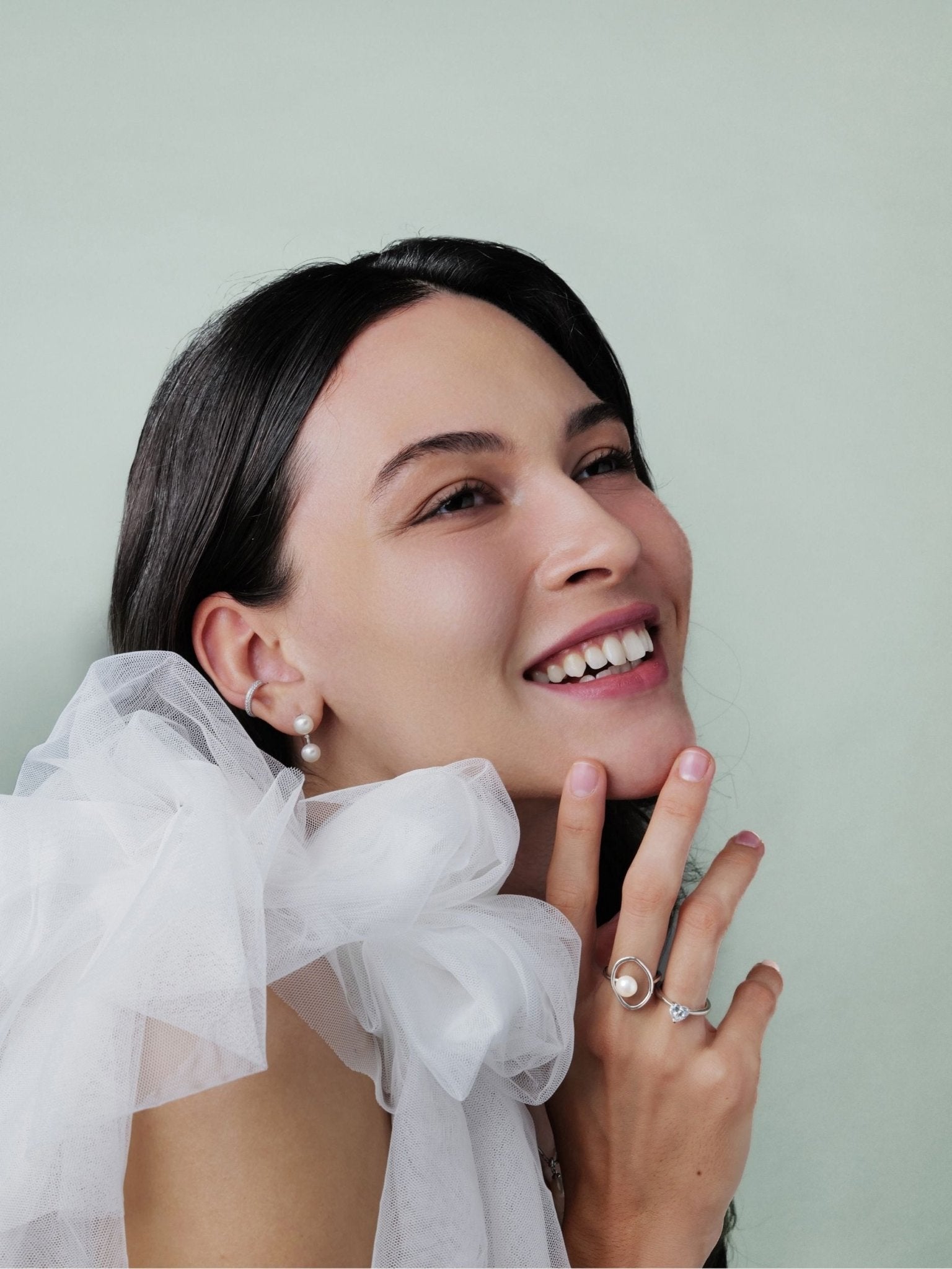 Anya pearl ring worn on the hand