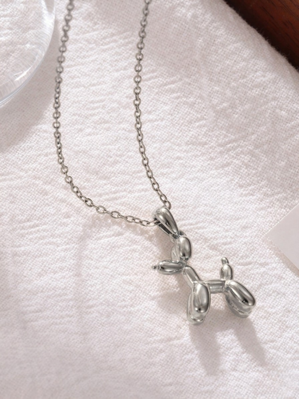MNML Atelier Balloon Pup Pendant Necklace in titanium silver — front view, balloon dog necklace Malaysia