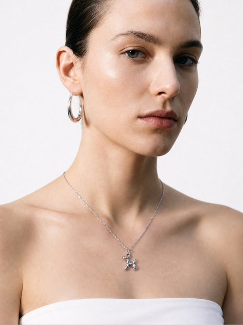 Model wearing MNML Atelier Balloon Pup Pendant Necklace at collarbone — artful everyday necklace Malaysia