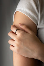 Model wearing MNML Auri Eternal Diamond Ring on finger — minimal commitment ring Malaysia