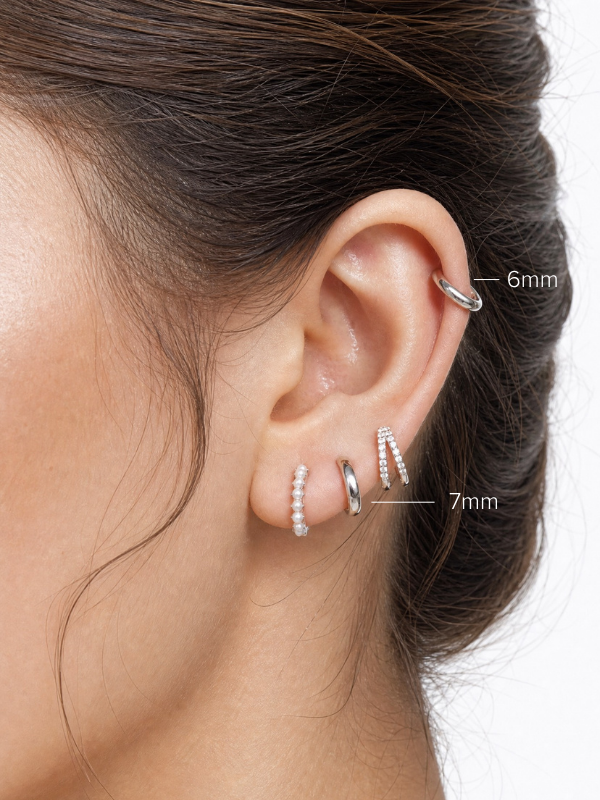 Ear curation styling with MNML Ayla Essential Huggie layered with other huggie