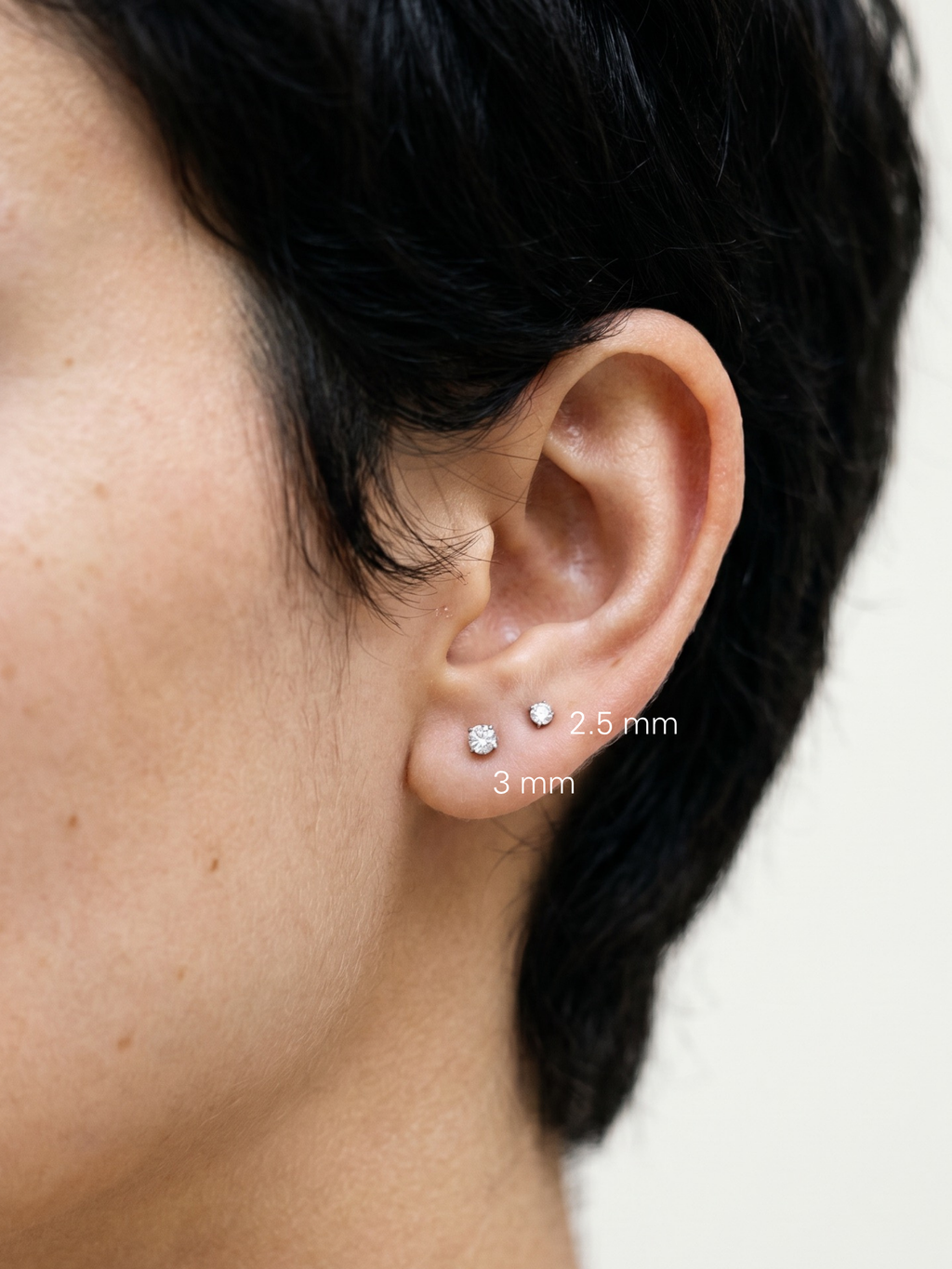 Model wearing MNML Basic Diamond Single Barbell Stud 2.5mm at lobe — barely-there CZ barbell Malaysia